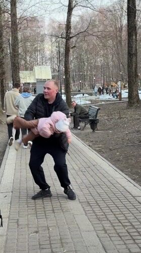 Families gather at Klin playground during spring afternoon