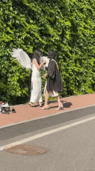 Graduation celebration with angel wings, roses in Zhongtun