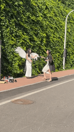 Graduation celebration with angel wings, roses in Zhongtun