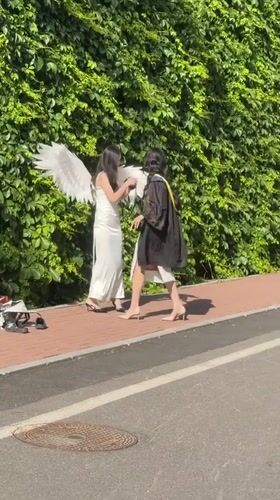 Graduation celebration with angel wings, roses in Zhongtun