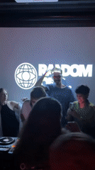 DJ performs for dancing crowd at Estosadok club