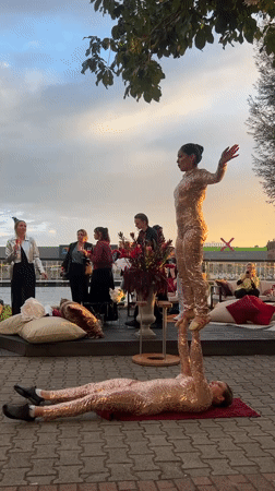 Acrobatics and live piano at a Berlin waterfront sunset event