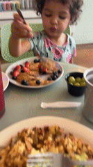 Pancakes with fresh berries at an El Paso breakfast table