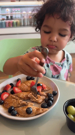 Pancakes with fresh berries at an El Paso breakfast table