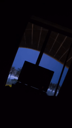 Dim interior scenes and a resting moth in Phú Quốc