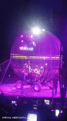 Motorcycle globe act and light show at packed Caracas arena