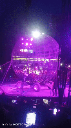 Motorcycle globe act and light show at packed Caracas arena