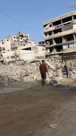 Dawn cleanup efforts documented amid widespread destruction in Gaza