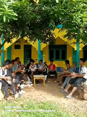Young men gather for organized activities in Lhokseumawe