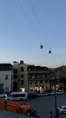 Evening scenes captured cable cars and outdoor art display in Tbilisi