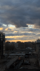 Window photography session captures cloudy Perm cityscape views