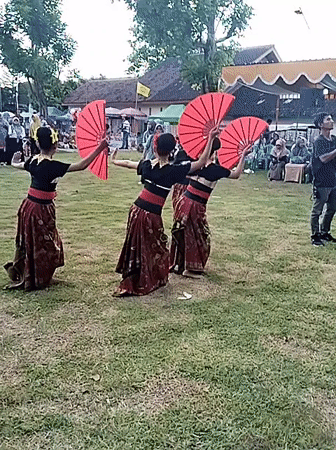 Young dancers perform traditional dances at outdoor cultural event
