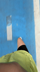 Woman jogs and takes selfies at Fethiye marina