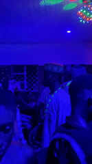 Indoor party with dancing captured in northern Nigeria villages