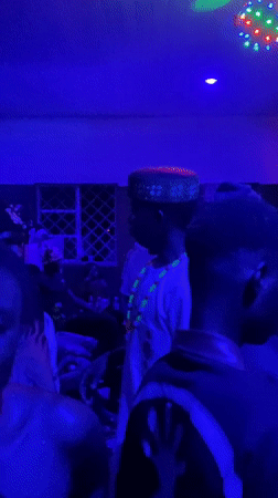 Indoor party with dancing captured in northern Nigeria villages