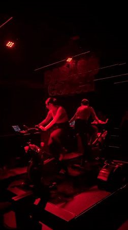 Spin class participants work out at Puebla fitness studio