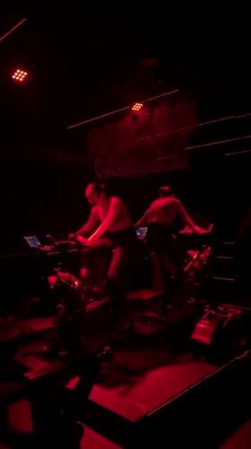 Spin class participants work out at Puebla fitness studio