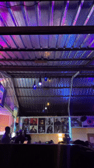 Friends photographed at colorful industrial-style cafe venue