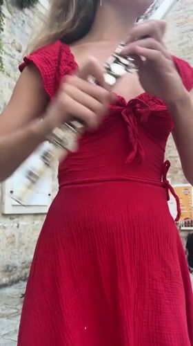 Live flute performance on a sunny afternoon in Budva