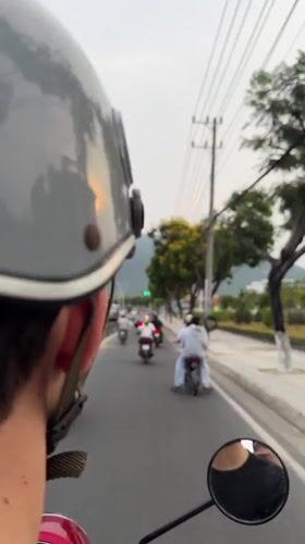 Motor scooter traffic observed in Vietnam heritage area
