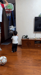 Child's indoor playtime captured in Shapingba District