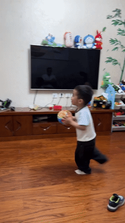 Child's indoor playtime captured in Shapingba District