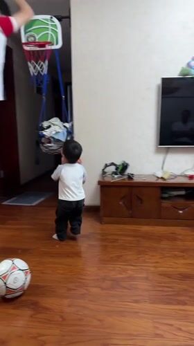 Child's indoor playtime captured in Shapingba District
