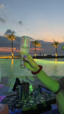 Poolside celebration with champagne and seafood in North Kuta