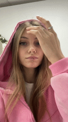 Woman captures morning selfies and pets in Russian home