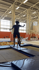 Young athletes practice backflips at Krasnoyarsk gymnasium