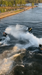 Jet skiers navigate rapids in Krasnoyarsk river