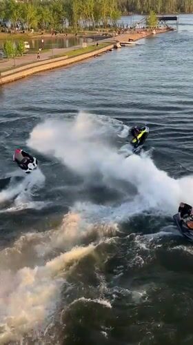 Jet skiers navigate rapids in Krasnoyarsk river