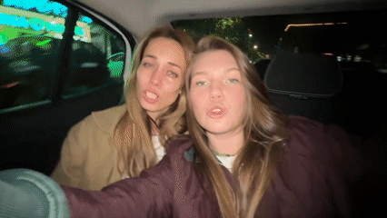 Two women film selfie video in car, Belgrade