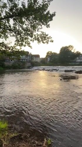 Evening tranquility captured along Lahn River in Marburg