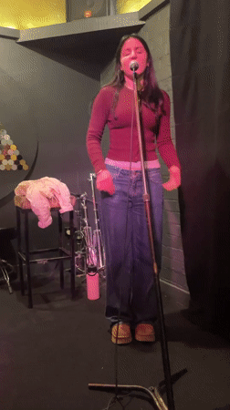 Live vocal performance on a Melbourne stage, July 2026