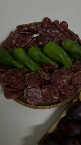 Charcuterie boards arranged in Valencia dining setup