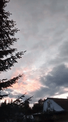 Sunset captured over residential neighborhood in 1-Go Maya, Russia