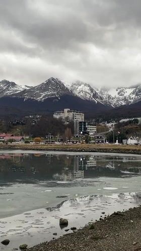 Evening life documented in Ushuaia harbor under cloudy skies