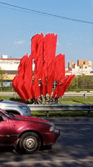 Red flags displayed along roadside in Voronezh, Russia