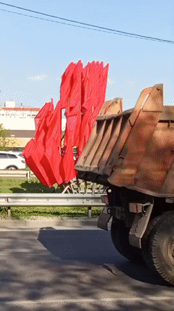 Red flags displayed along roadside in Voronezh, Russia