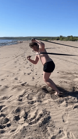 Beach workout session on a sunny morning in Krasnoturansk