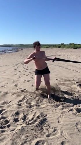 Beach workout session on a sunny morning in Krasnoturansk