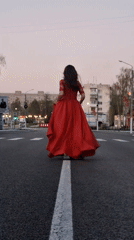 Woman in red dress seen on Chaikovsky streets