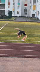 Girl performs backbend on athletic field in Saratov