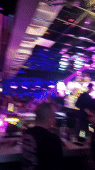 Crowded nightclub scene captured in Dobrich, Bulgaria