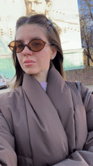 Woman records selfie video in early morning Klin