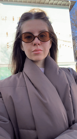 Woman records selfie video in early morning Klin