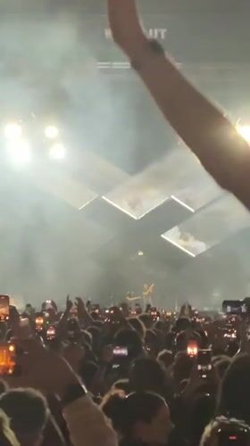 Outdoor concert with geometric stage design draws crowds in Barcelona