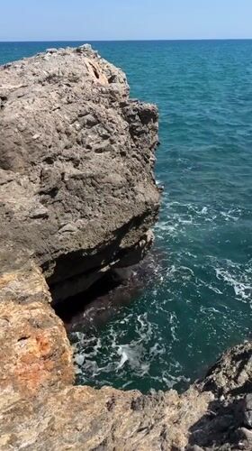 Rocky Costa del Azahar coastline explored on a clear afternoon