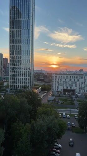 City skyline at sunset, drone views and a coffee moment